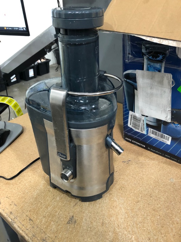 Photo 2 of (INCOMPLETE, NOT FUNCTIONING)1000-Watt 40 oz. Black/Silver Self-Cleaning Professional Juice Extractor with Auto-Clean Technology and XL Capacity
**DID NOT POWER ON, MISSING SMALL CUP**