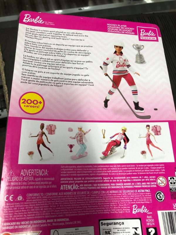 Photo 3 of Barbie Winter Sports Hockey Player Brunette Doll, Curvy Shape (12 in) with Jersey, Helmet, Hockey Stick, Puck & Trophy, Multi
