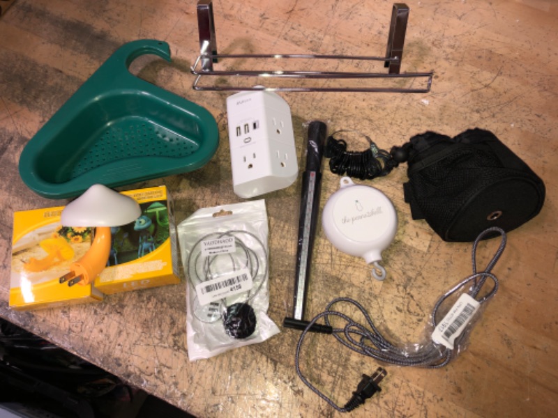 Photo 1 of BUNDLE OF MIXED ITEMS - 1
2 PLASTIC SINK HOLDERS, CHROME TOWEL RACK, USB OUTLET, RING SIZER SETM SMALL CARRY BAG, POWER CORD??, PACK OF WIRE LOCKS, 2 MUSHROOM INSECT LAMPS