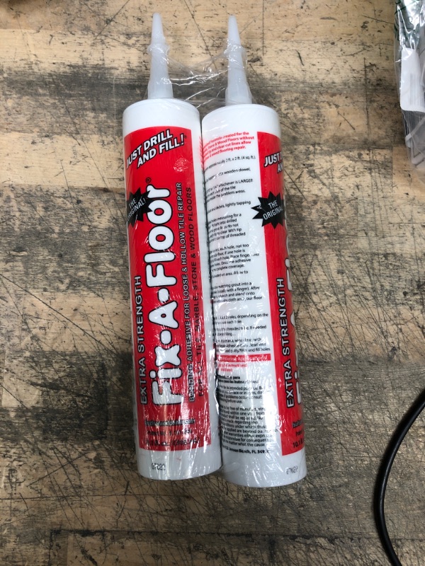 Photo 2 of (2 PACK) Fix-A-Floor 10.1 Oz. Repair Adhesive
