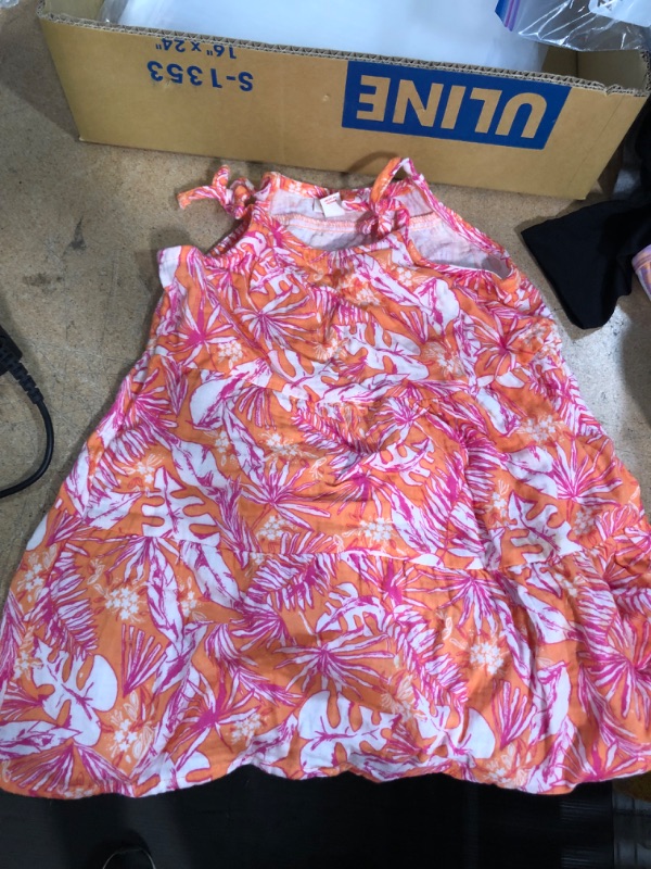 Photo 2 of size 5T girls green ruffled dress. and size 4T girls pink and orange Hawaiian style dress   