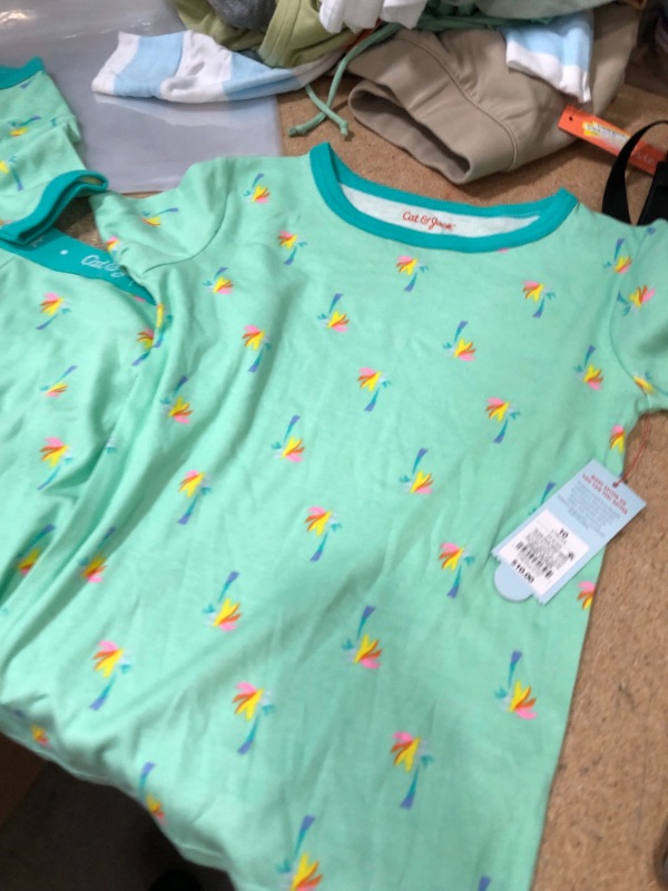 Photo 1 of 2 shirts and 1 shorts size 10 in kids cat and jack 