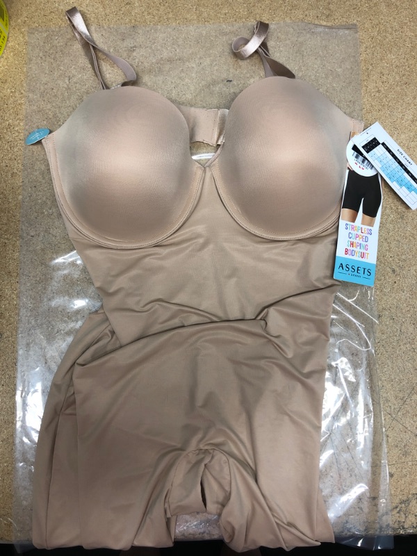 Photo 1 of ASSETS BY SPANX Women's Flawless Finish Strapless Cupped Midthigh Bodysuit
SIZE 1X