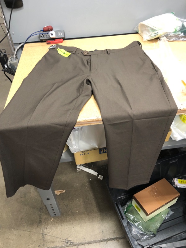 Photo 1 of Haggar Men's ECLO Stria Expandable-Waist Plain-Front Dress Pant (40W X 29L)
