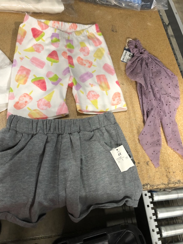 Photo 1 of Clothing Bundle (3T toddler biker shorts, 4T toddler shorts, floral hair tie, and women's v neck t shirt - M)