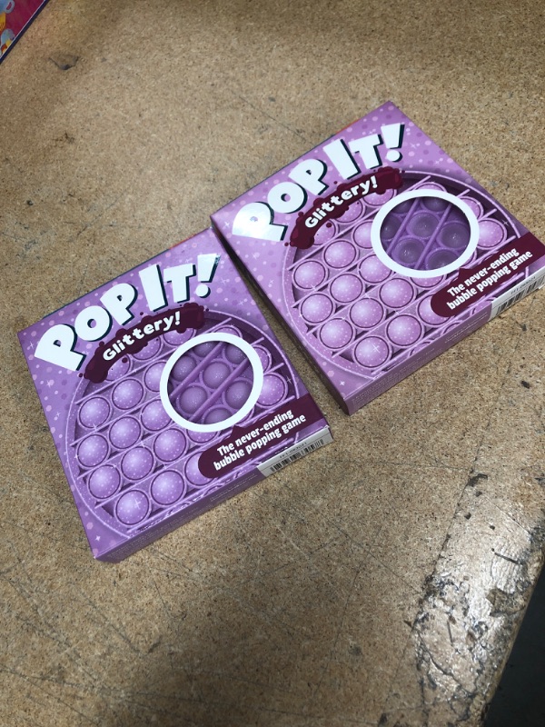 Photo 2 of Chuckle & Roar Pop It! Fidget and Sensory Game Glitter Purple COMES WITH 2