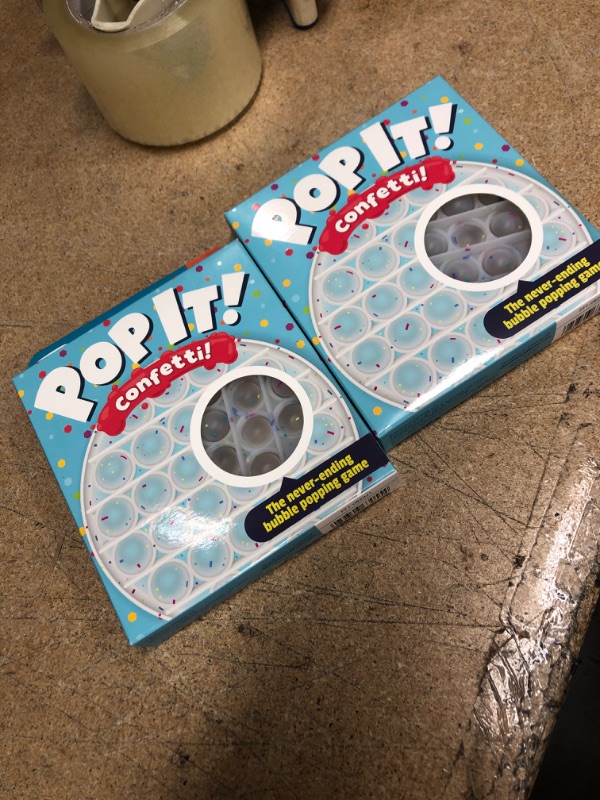 Photo 1 of Chuckle & Roar Pop It! Fidget and Sensory Game - Confetti
 COMES WITH 2