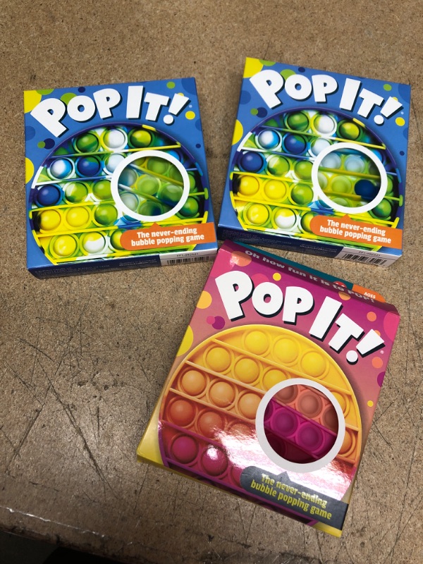 Photo 2 of Chuckle & Roar Pop It! Blue-Green Tie Dye Bubble Popping and Sensory Game
*COMES WITH 2 PLUS ONE PINK*