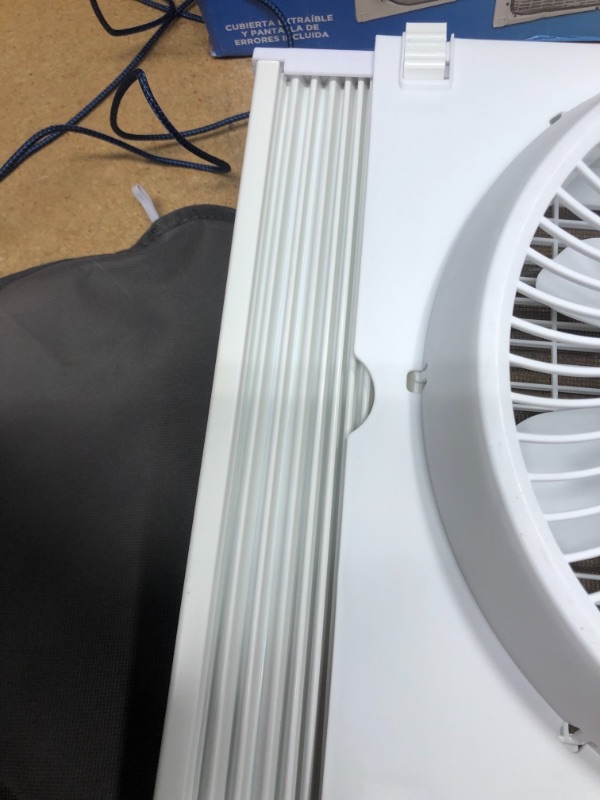 Photo 3 of Comfort Zone Dual Digital Reversible Window Fan with Bug Screen
