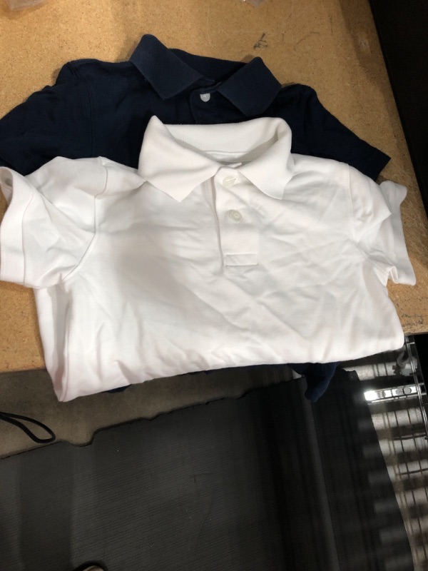 Photo 1 of Boys' Short Sleeve Stretch Pique Uniform Polo Shirt - Cat & Jack™
SIZE XS 4/5