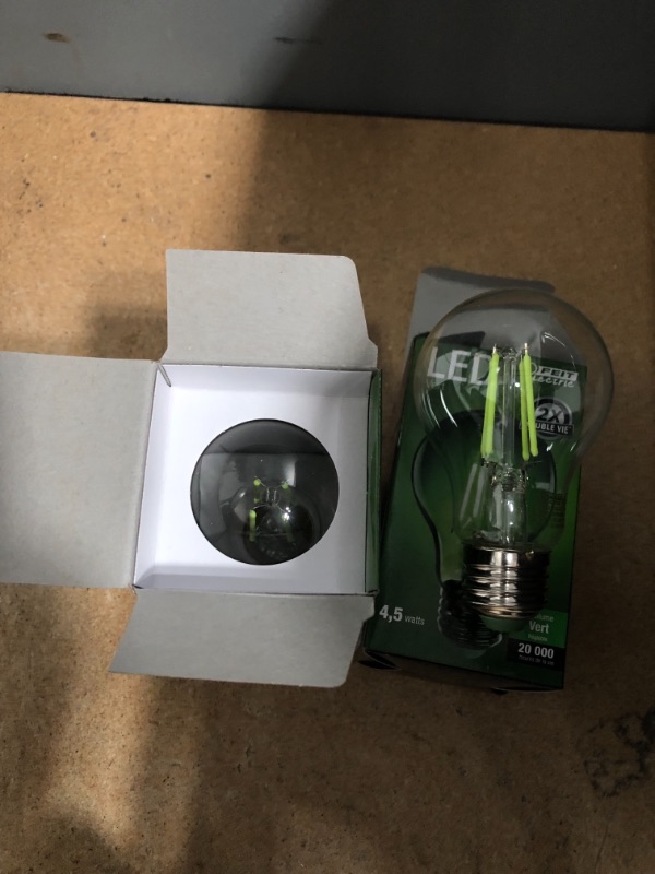 Photo 2 of Feit Electric A19/TG/LED Led Bulb, Flood/Spotlight, A19 Lamp, E26 Lamp Base, Dimmable, Clear, Transparent Green Light 2 pack 
