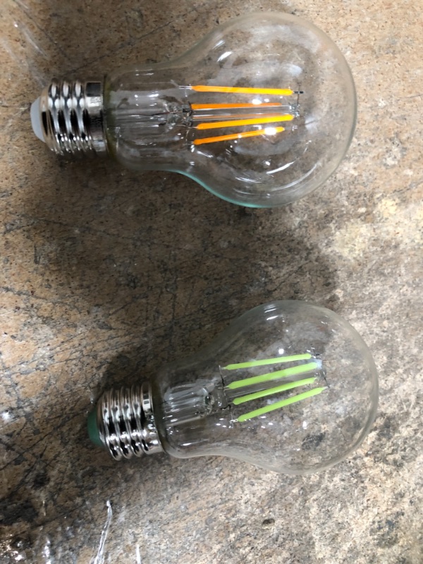 Photo 2 of Feit Electric A19/TG/LED Led Bulb, Flood/Spotlight, A19 Lamp, E26 Lamp Base, Dimmable, Clear, Transparent Green Light and Orange Light 2 pack 
