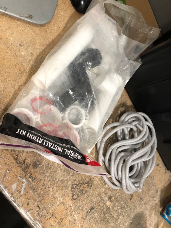 Photo 5 of 1-1/2 in. White Plastic Slip-Joint Garbage Disposal Install Kit with Dishwasher Garbage Disposal Connector and 3/8 in. x 20 ft. Grey Poly Foam Caulk Saver