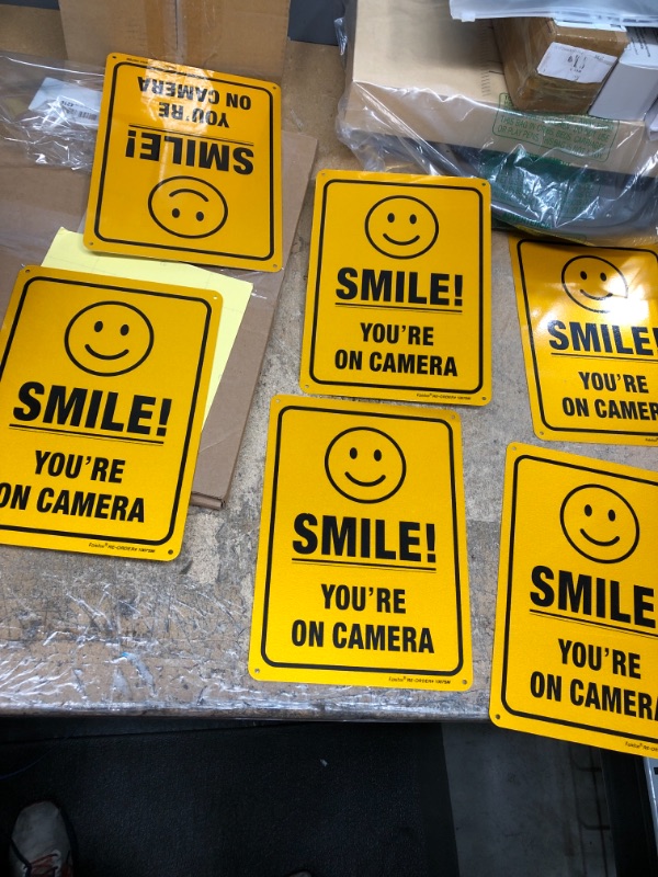 Photo 2 of  7 x 10 inch “Smile - You're On Camera” Yard Sign PACK OF 6