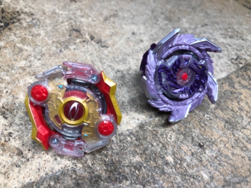 Photo 2 of BEYBLADE Burst Surge Speedstorm Kolossal Fafnir F6 and Odax O6 Spinning Top Dual Pack -- 2 Battling Game Top Toy for Kids Ages 8 and Up (RED ONE MISSING TIP ON BOTTOM)