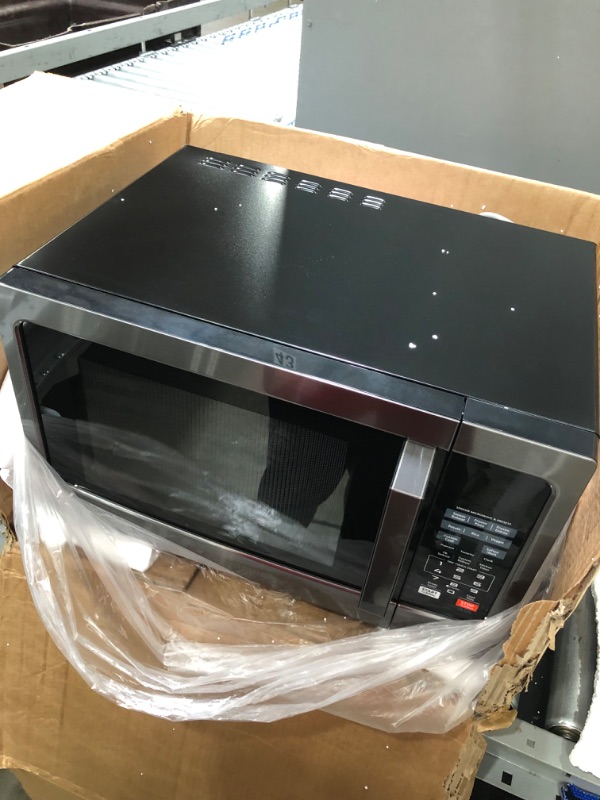 Photo 1 of *SELLING FOR PARTS, not functional* 
TOSHIBA EM131A5C-BS Countertop Microwave Ovens 1.2 Cu Ft, 12.4" Removable Turntable Smart Humidity Sensor 12 Auto Menus Mute Function ECO Mode Easy Clean Interior Black Color 1100W
