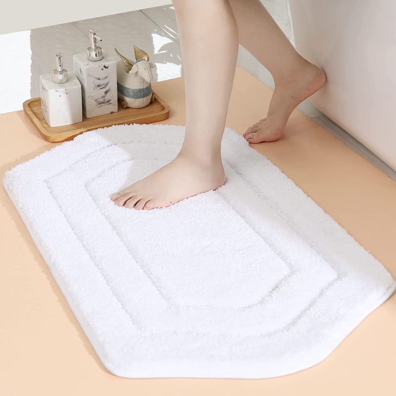 Photo 1 of COSY HOMEER Extra Thick Bath Rugs for Bathroom - Anti-Slip Bath Mats Soft Plush Yarn Shaggy 100% Strong Mirco Polyeste Mat Living Room Bedroom Mat Floor Water Absorbent(White,17x27 - Inches)