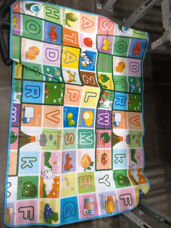 Photo 1 of Kids Play Mat 2-Sided One side Alphabet, and the other is Creatures and Castle