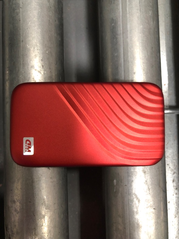 Photo 3 of WD 1TB My Passport SSD Portable External Solid State Drive, Red, Sturdy and Blazing Fast, Password Protection with Hardware Encryption - WDBAGF0010BRD-WESN
