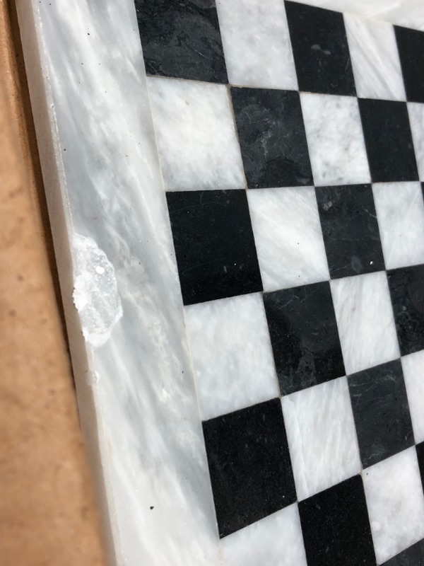 Photo 3 of DAMAGED Marblous Krafts 15 Inches White & Black Chess Set with 32 Metallic Figures & 2 Extra Queens and Marble Board White and Black
**CHIPPED**