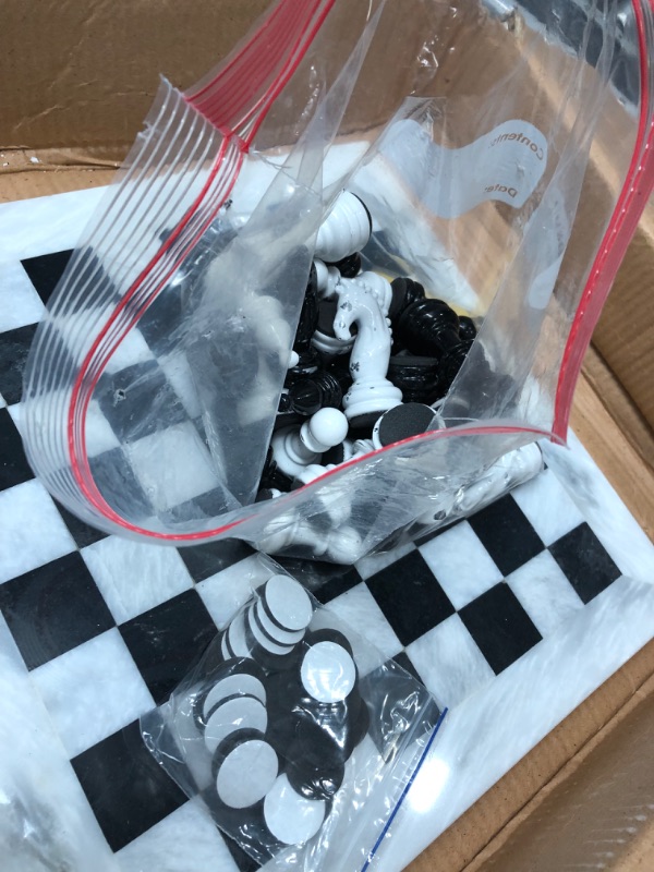 Photo 4 of DAMAGED Marblous Krafts 15 Inches White & Black Chess Set with 32 Metallic Figures & 2 Extra Queens and Marble Board White and Black
**CHIPPED**