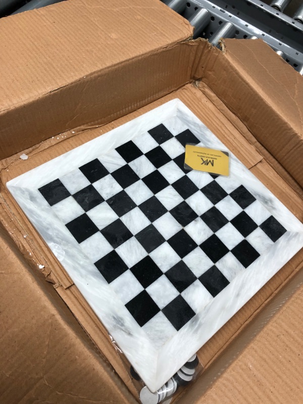 Photo 2 of DAMAGED Marblous Krafts 15 Inches White & Black Chess Set with 32 Metallic Figures & 2 Extra Queens and Marble Board White and Black
**CHIPPED**