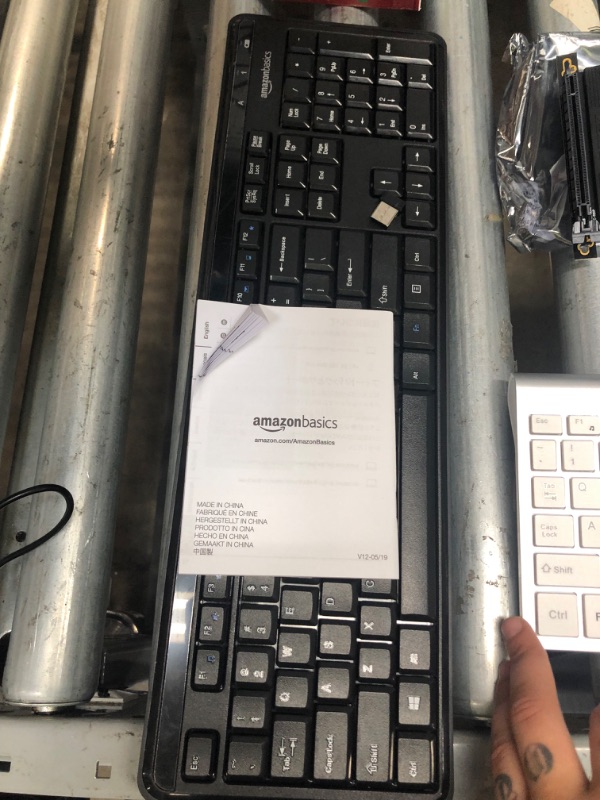 Photo 1 of bundle of Amazon Basics Wireless Computer Keyboard and Mouse Combo - Quiet and Compact - US Layout (QWERTY)**missing mouse,Wireless Keyboard and Mouse,J JOYACCESS USB Slim Wireless Keyboard Mouse with Numeric Keypad Compatible with iMac Mac PC Laptop Tabl