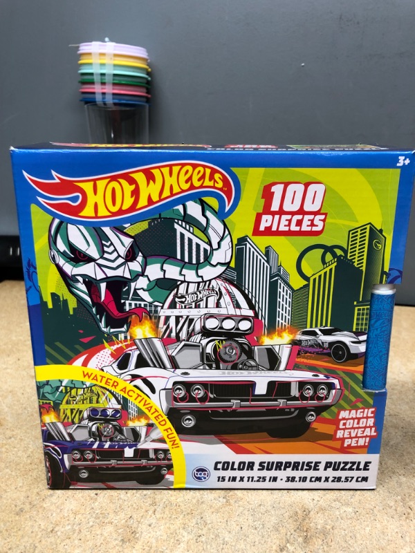 Photo 2 of bundle of 2 items 
Hot Wheels Color Surprise 100 Piece Magic Water Reveal Puzzle with Water Pen Included by TCG Toys, Multicolor and EeBoo Piece and Love: Eating Outside Jigsaw Puzzle - 1000pc

 