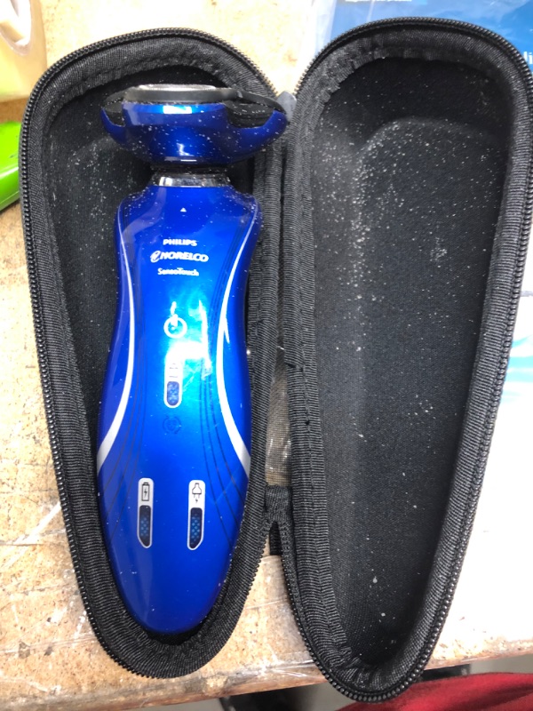 Photo 3 of Philips Norelco Shaver 7700, Rechargeable Wet & Dry Electric Shaver with SenseIQ Technology, Quick Clean Pod, Charging Stand and Pop-up Trimmer, S7782/85
