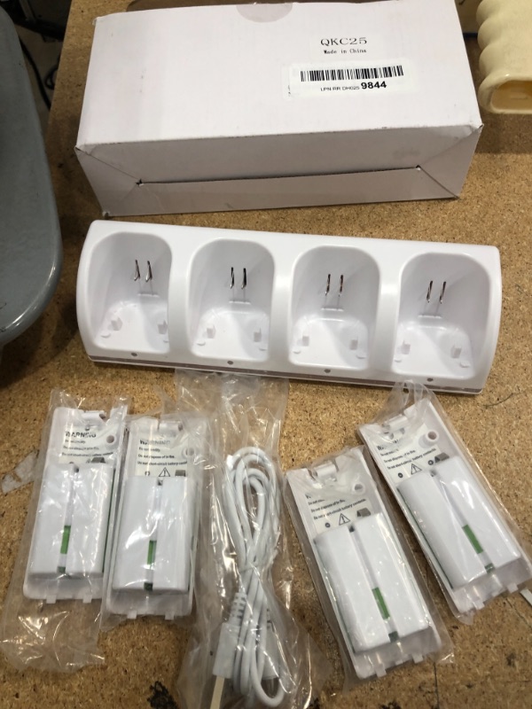 Photo 2 of 4-in-1 Charging Station for Wii&Wii U Remote Controller,Charger with 4 Rechargeable Battery Packs (4 Port Charging Station+4 pcs 2800mAh Replacement Batteries+USB Cable),Remote Not Included
