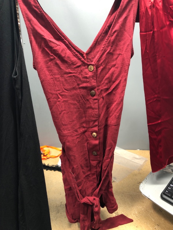 Photo 1 of BUNDLE OF USED WOMENS CLOTHING... 3
LONG BLACK COTTON PULLOVER DRESS, LARGE. RED JUMPER (MISSING BUTTON) SIZE MED, RED SLIP (SMALL TEAR) SIZE SMALL