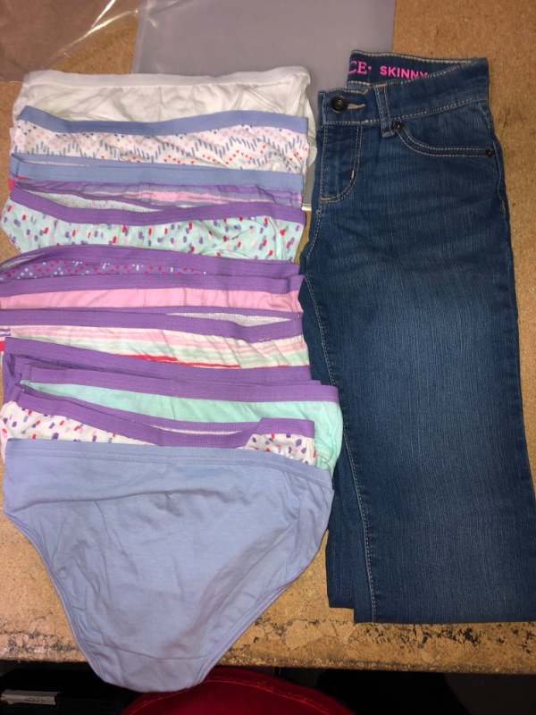 Photo 2 of BUNDLE OF GIRLS CLOTHING... 2
SIZE 6-7 PLACE SKINNY JEANS, 13 PACK FRUIT OF THE LOOMS PANTIES SIZE 10