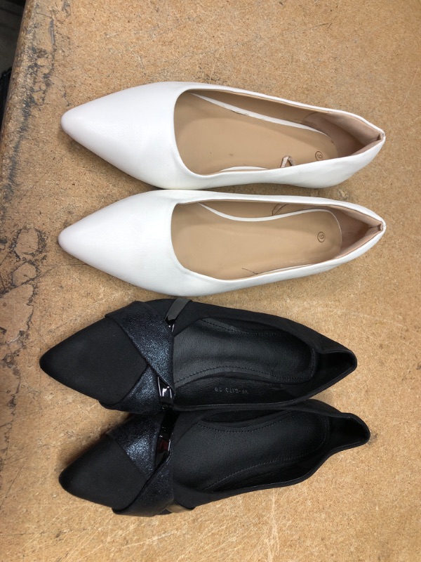 Photo 2 of BUNDLE OF 2 WOMENS SHOES
WHITE PAIR ARE SIZE 9, BLACK SIZE 7