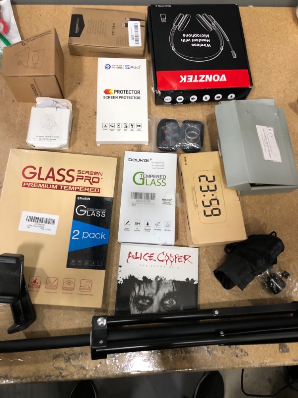 Photo 1 of Assorted Amazon Phone/Accessories Bundle 15 pack; Samsung Screen Protectors, Headphones, Tea Lights, Clocks, Phone Stands 