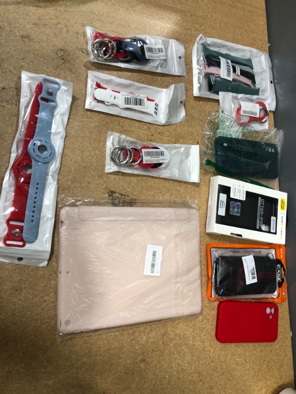 Photo 1 of Assorted Amazon Phone/Accessories Bundle 11 Pack; iPhone x/12 Cases, I Pad 8th Gen Case a with Airpod/Watch Accessories 