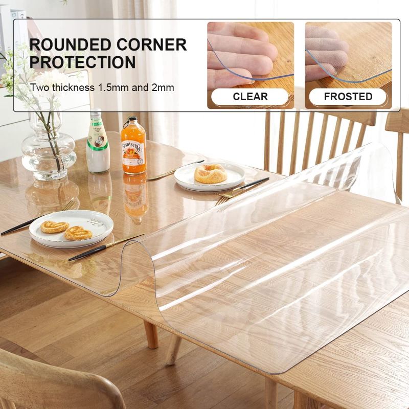 Photo 2 of OstepDecor 2mm Thick 54 x 20 Inch Clear Table Cover Protector, Desk Cover Plastic Table Protector Clear Table Pad Tablecloth Protector, Clear Desk Pad Mat for Coffee Table, Writing Desk 5ft