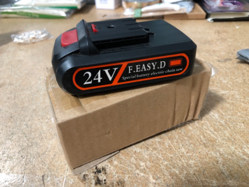 Photo 2 of Mini Chainsaw Battery Replacement, 24V 2000mAh Rechargeable Battery, Cordless Electric Portable Handheld Chainsaw Accessories (Model 1)
