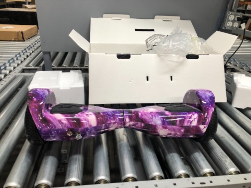Photo 1 of Hover-1 Helix Electric Hoverboard | 7MPH Top Speed, 4 Mile Range, 6HR Full-Charge, Built-in Bluetooth Speaker, Rider Modes: Beginner to Expert