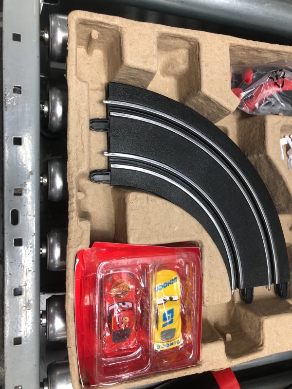 Photo 2 of First Cars 3 - Slot Car Race Track - Includes 2 Cars: Lightning McQueen and Dinoco Cruz - Battery-Powered Beginner Racing Set for Kids Ages 3 Years and Up