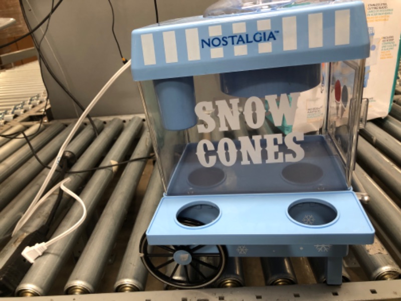 Photo 3 of Nostalgia Vintage Countertop Snow Cone Maker Makes 20 Icy Treats, Includes 2 Reusable Plastic Cups & Ice Scoop – Blue
**missing scoop
