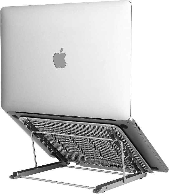 Photo 1 of Laptop Stand Upgraded, Adjustable Portable Laptop Holder for Desk, Aluminum Ventilated Notebook Riser for MacBook Air Pro, More 10-15.6 inches PC Computer, Tablet, iPad (Silver)
