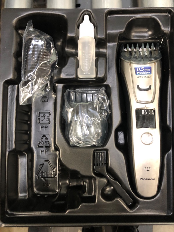 Photo 2 of heavily used**Panasonic Multi-Groomer Men’s Trimmer for Beard, Hair and Body, 39 Trim Length Settings with 3 Attachments, Corded/Cordless Operation – ER-GB80-S (Silver)**MISSING CHARGER**
