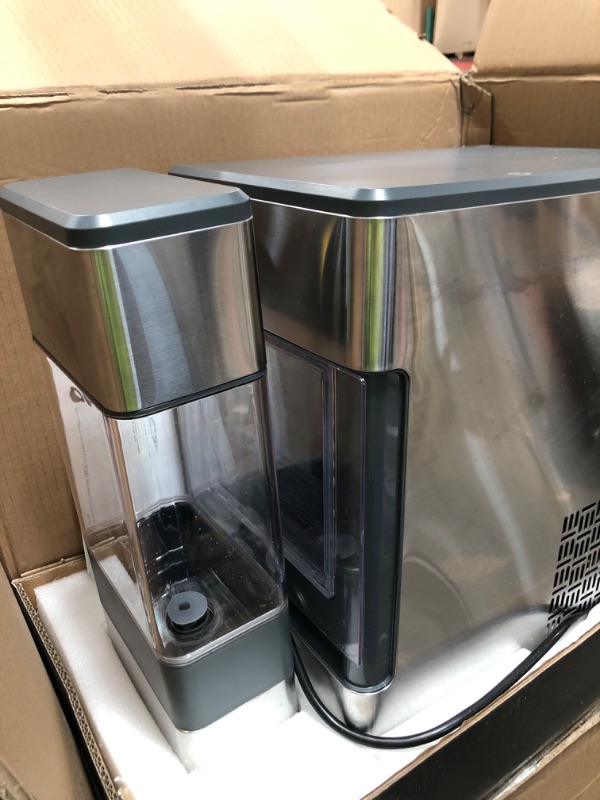 Photo 1 of GE Profile Opal | Countertop Nugget Ice Maker with Side Tank | Portable Ice Machine Makes up to 24 lbs. of Ice Per Day | Stainless Steel Finish
