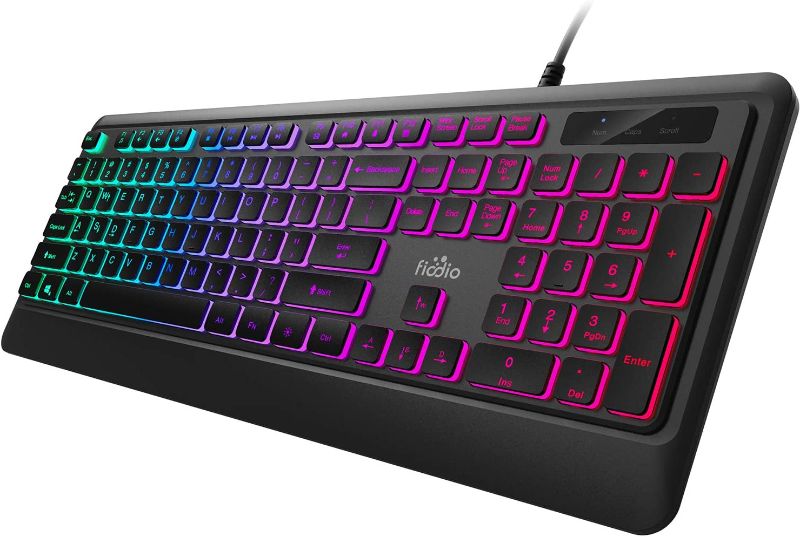 Photo 1 of Fiodio Rainbow Membrane Gaming Keyboard, Quiet Wired Computer Keyboard, 104 Silent Keys, 26 Anti-Ghosting Keys, Spill Resistant, Multimedia Control for PC and Desktop
