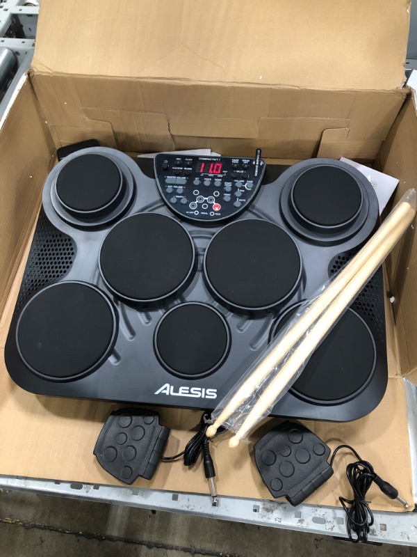 Photo 2 of Alesis CompactKit 7 - Tabletop Electric Drum Set with 265 Electronic and Acoustic Drum Kit Sounds, 7 Pads, and Drum Sticks
