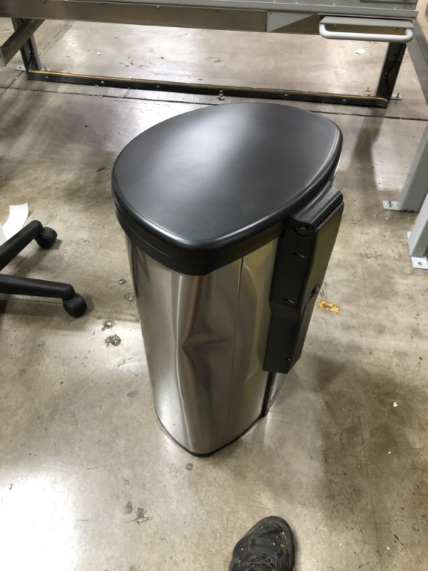 Photo 2 of (DENTED SIDE) Amazon Basics Automatic Hands-Free Stainless Steel Trash Can - Toe tap, 50-Liter
