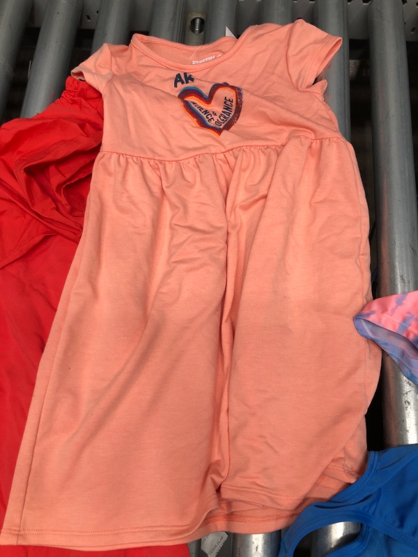 Photo 2 of **Small bundle**
Orange dress S
Girls swimwear  5T
Pink Dress 4/5
