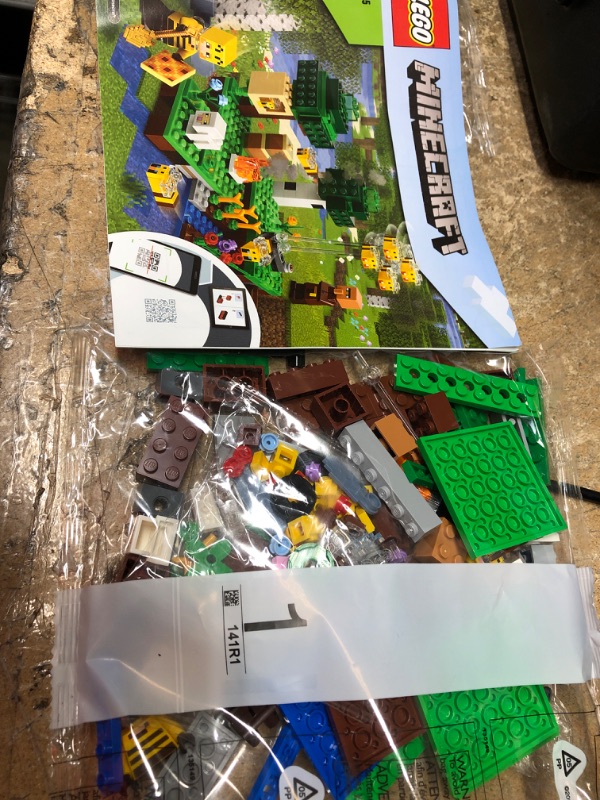 Photo 2 of **MISSING LEGOS** LEGO Minecraft The Bee Farm 21165 Minecraft Building Action Toy with a Beekeeper, Plus Cool Bee and Sheep Figures, New 2021 (238 Pieces),Multicolor
