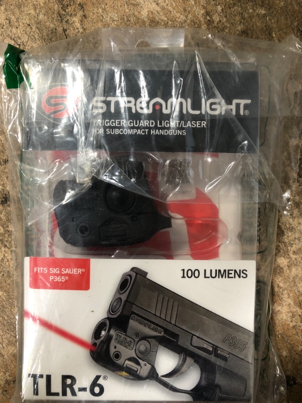 Photo 2 of **BROKEN LOCK**
Streamlight 69284 TLR-6 Tactical Pistol Mount Flashlight 100 Lumen with Integrated Red Aiming Laser Designed Exclusively and Solely for Sig Sauer P365, Black