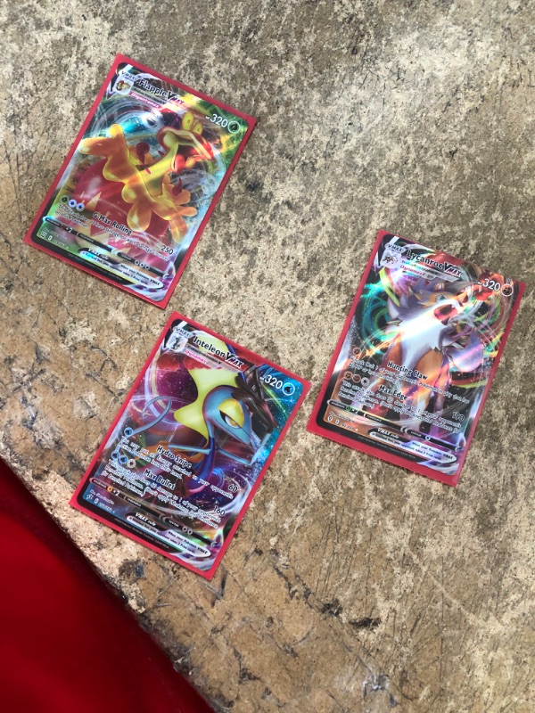 Photo 1 of 3 pokemon cards vmax edition 
flapple, inteleon, lycanroc 